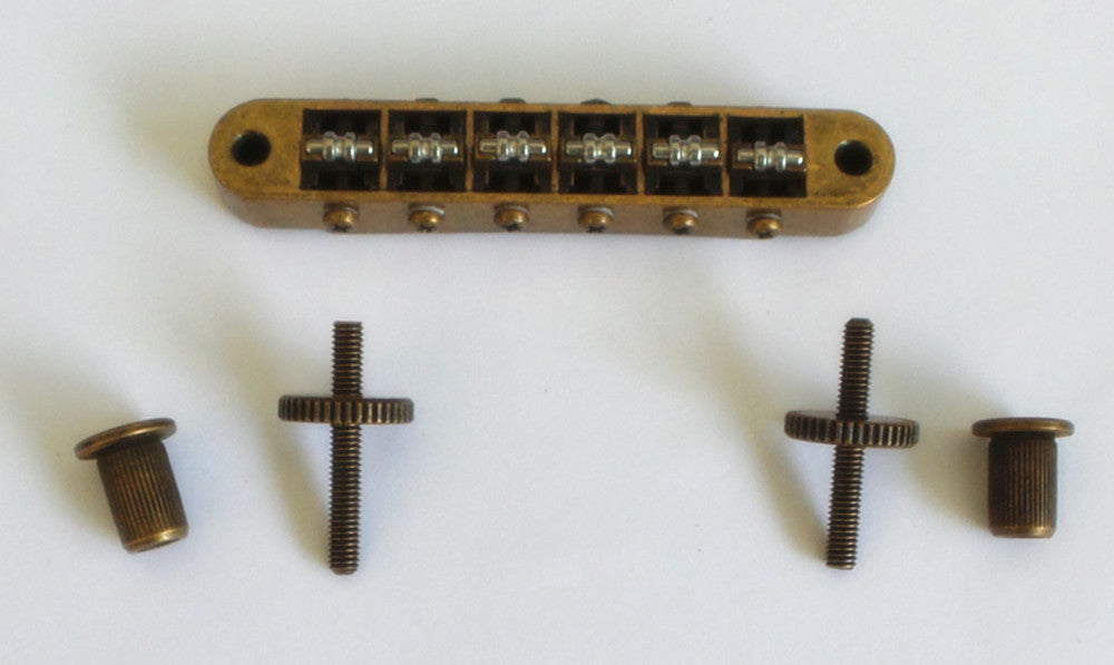 New Roller Bridge,4mm Post Hole,Tune-O-Matic Bridge,With Screw Post and Wheel,Curved Bottom Base,Antiqued Brass finish