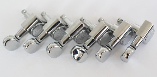 Left hand machine head,Wilkinson,6INLINE,Chrome,Classic oval "F" style vintage button with sealed housing and 45 degree fixing tag
